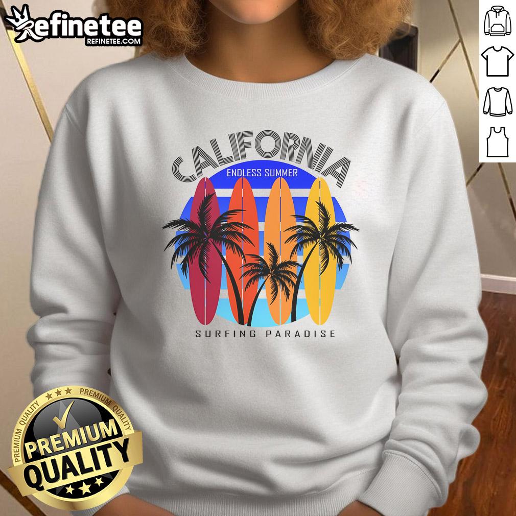 California Surfing Paradise Endless Summer Sweatshirt featuring vibrant ocean waves and a surfer silhouette.