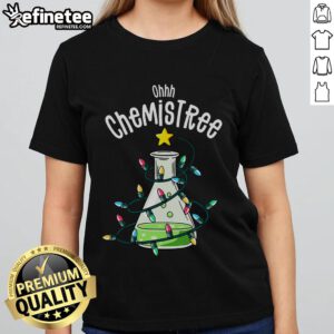 Funny science teacher wearing 'Oh Chemistree' tee, showcasing chemistry humor for ladies in a vibrant classroom setting.