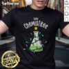 Funny science teacher wearing 'Oh Chemistree' chemistry t-shirt with lab equipment in a classroom setting.