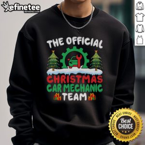 Cheerful car mechanic team wearing Christmas sweatshirts, working on auto repairs during the holiday season.