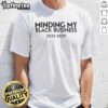 Alt Text: Official Minding My Black Business 2025-2029 T-Shirt featuring bold text and a stylish design for empowerment.
