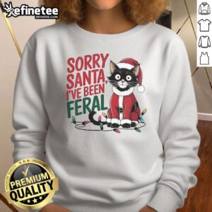 Feral Christmas sweatshirt featuring a cute Santa cat and the phrase 'Sorry Santa, I've Been Feral' for Christmas 2024.