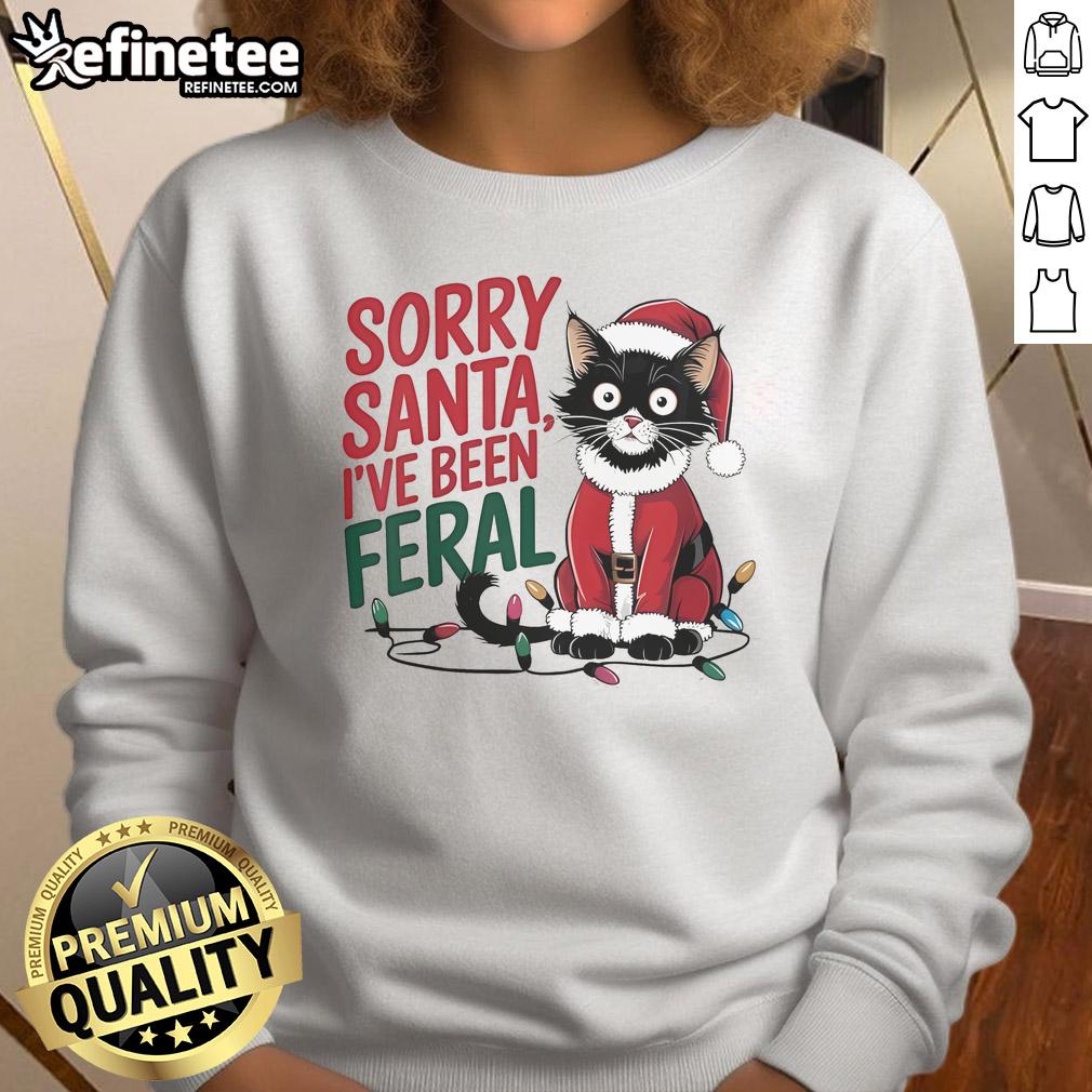 Feral Christmas sweatshirt featuring a cute Santa cat and the phrase 'Sorry Santa, I've Been Feral' for Christmas 2024.