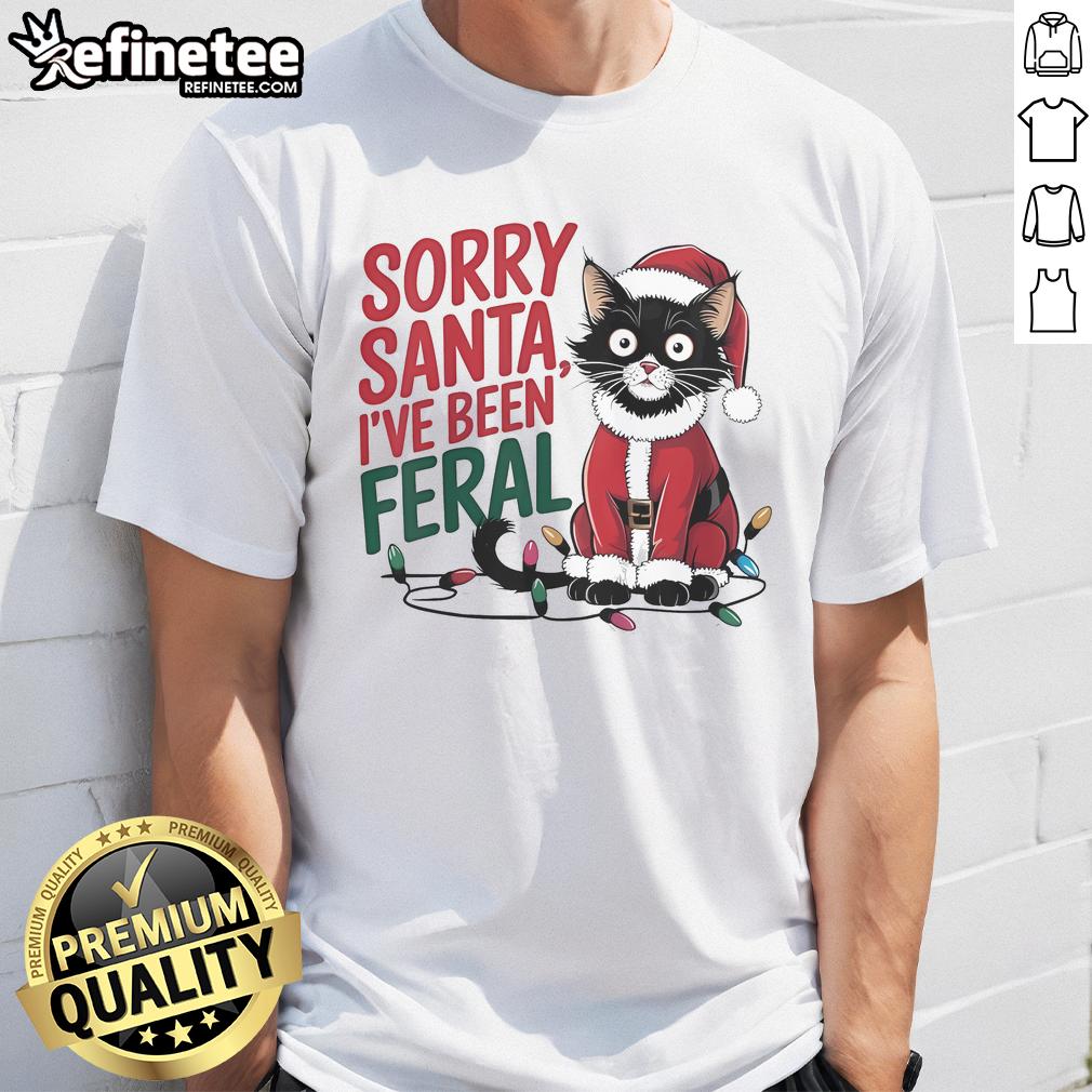 Funny 'Sorry Santa Ive Been Feral' Christmas T-Shirt featuring a cute Santa cat design for the 2024 holiday season.