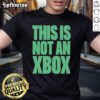 Alt Text: Official This Is Not An Xbox T-Shirt featuring a humorous design, perfect for gamers and fans of gaming culture.