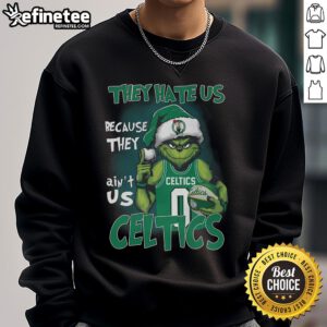 Cozy Boston Celtics sweatshirt featuring 'Top Grinch They Hate Us Because They Ain't Us' slogan for fans.