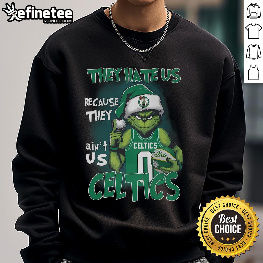 Cozy Boston Celtics sweatshirt featuring 'Top Grinch They Hate Us Because They Ain't Us' slogan for fans.