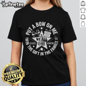Funny Christmas Put A Bow On Me Ladies Tee featuring a playful design perfect for festive holiday celebrations.