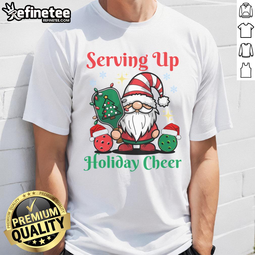 Funny Serving Up Holiday Cheer Pickleball Christmas T-Shirt featuring festive pickleball graphics and holiday designs.