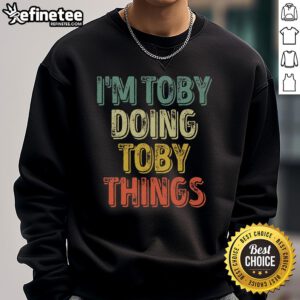 Vintage sweatshirt featuring 'Good Im Toby Doing Toby Things' for personalized style and comfort.