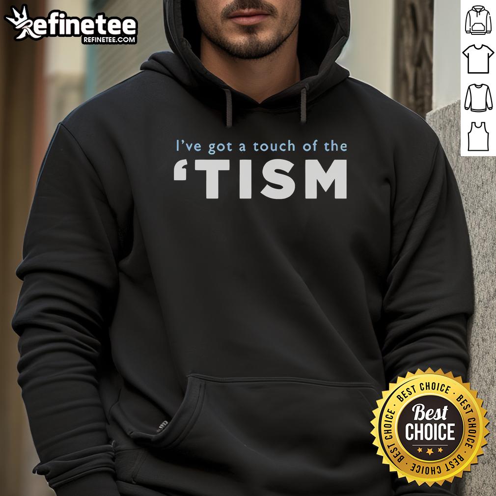 Person wearing a 'Good I've Got A Touch Of The Tism' hoodie, showcasing a stylish graphic design and vibrant colors.