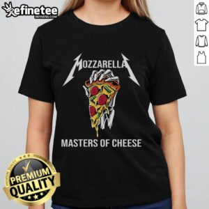 Foodie chef preparing delicious pizza with good mozzarella cheese, wearing a stylish ladies' tee in a cozy kitchen.