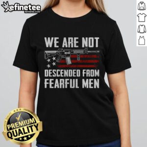 Hot AR-15 gun design on USA flag with 'We Are Not Descended From Fearful Men' text on ladies tee shirt.