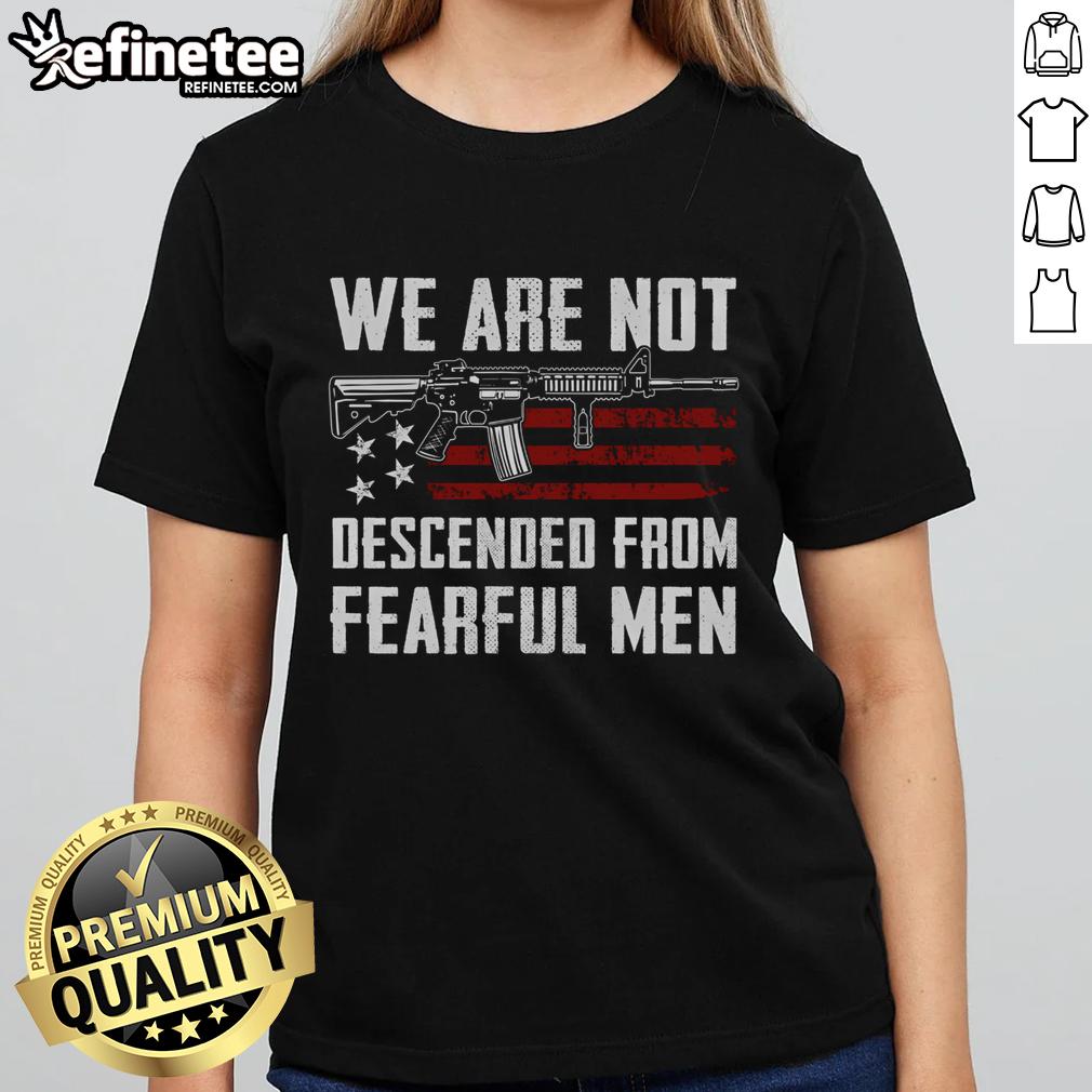Hot AR-15 gun design on USA flag with 'We Are Not Descended From Fearful Men' text on ladies tee shirt.
