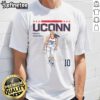 Alt Text: Hot Nika Muhl basketball player wearing a stylish lover team t-shirt on the court, showcasing team spirit.