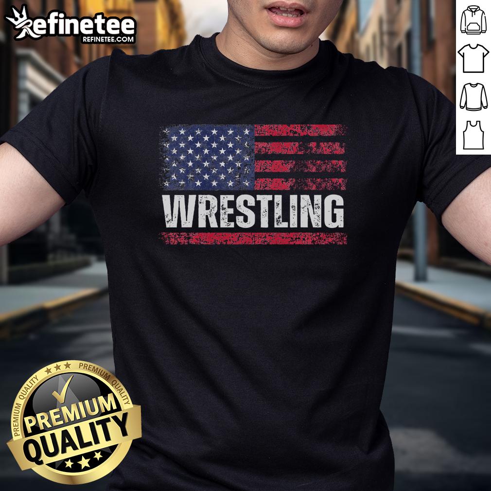 Vintage wrestling t-shirt featuring a hot design of the American flag, perfect for wrestling fans and patriotic supporters.