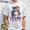 Girl wearing a messy bun and a Trump 2024 election T-shirt with an American flag design, promoting Nice Trump Girl style.