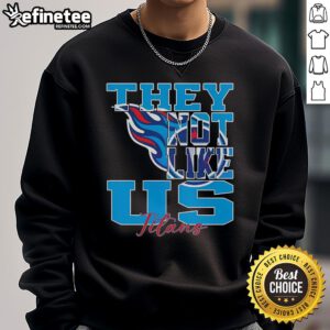 Official 'They Not Like Us' Tennessee Titans NFL Football 2025 Sweatshirt featuring team colors and logo design.