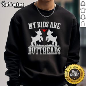 Goat mom wearing a funny sweatshirt featuring 'My Are Buttheads' design, perfect for goat lovers and farmers.