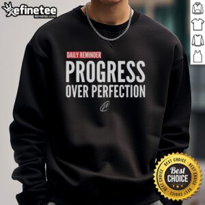 Cozy 'Progress Over Perfection' sweatshirt in a stylish design, perfect for daily motivation and casual wear.