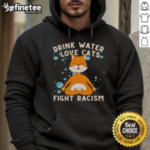 Cat mom in hoodie with 'Fight Racism' design, holding a nice drink of water, surrounded by adorable cats.