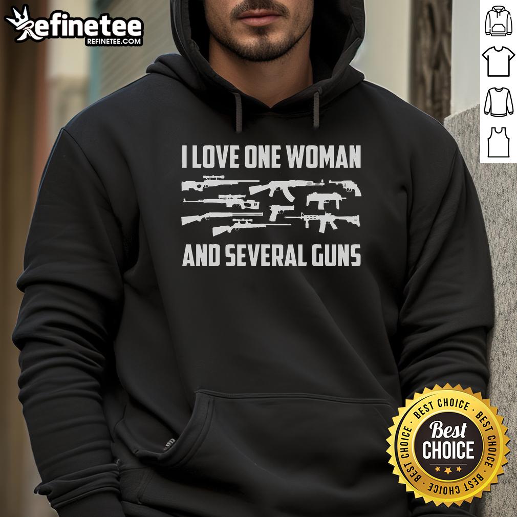 Woman wearing 'Nice One' hoodie, showcasing several guns, perfect for 2A gun lovers and enthusiasts.