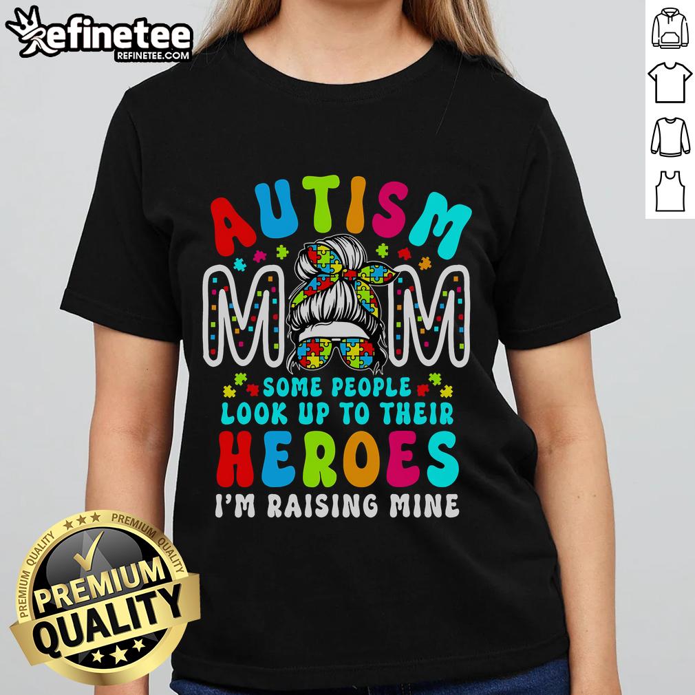 Groovy messy bun mom wearing a tee for Autism Awareness, celebrating top autism moms and raising awareness.