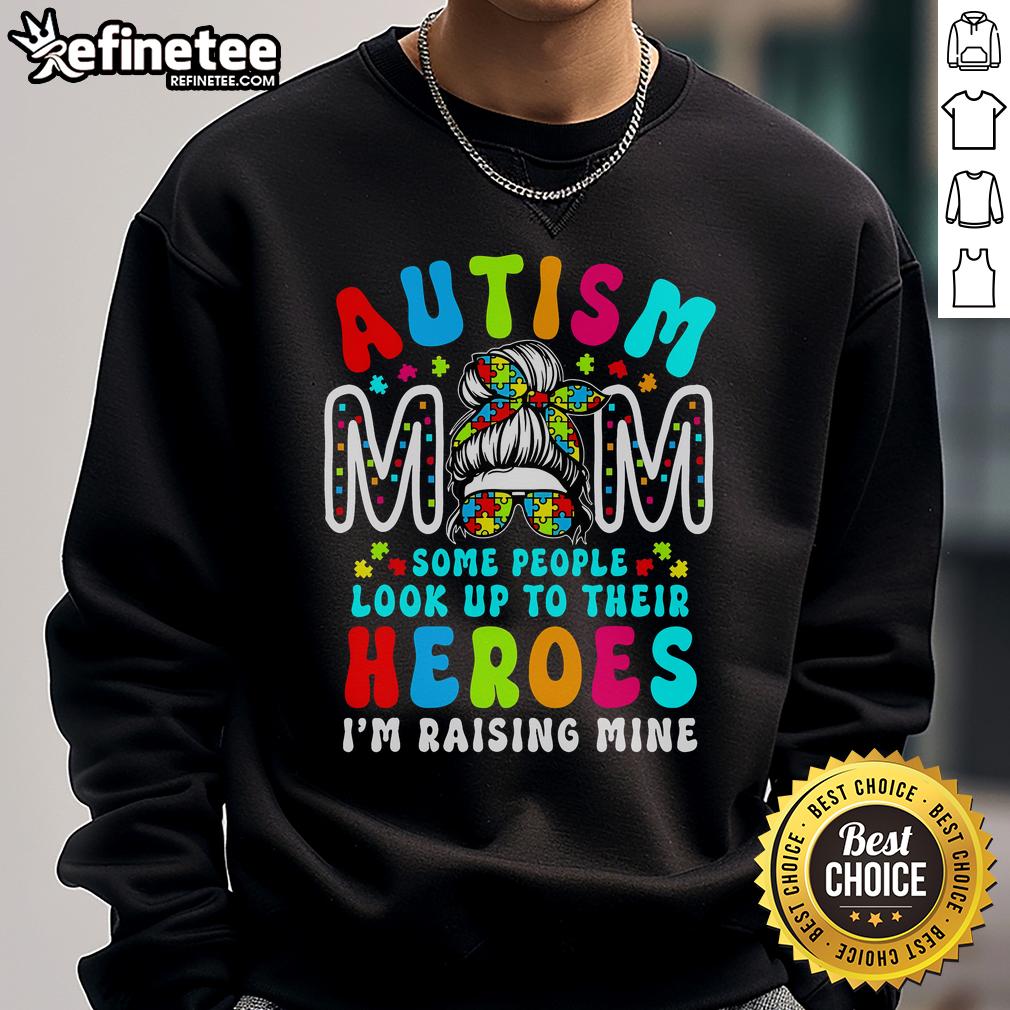 Top Autism Mom sweatshirt with a groovy messy bun design, promoting Autism awareness and celebrating motherhood.