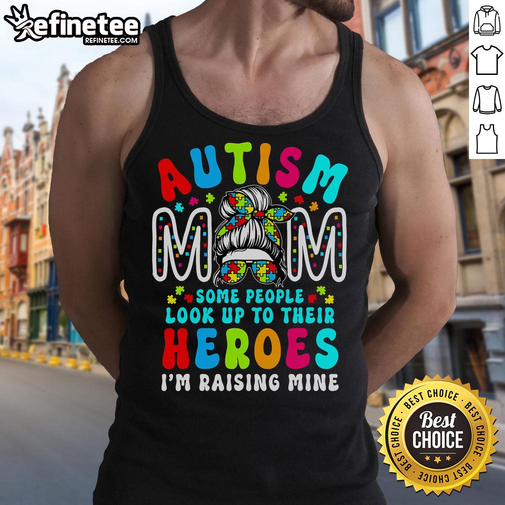 Top Autism Mom raising a hero wearing a groovy messy bun tank top for Autism Awareness.