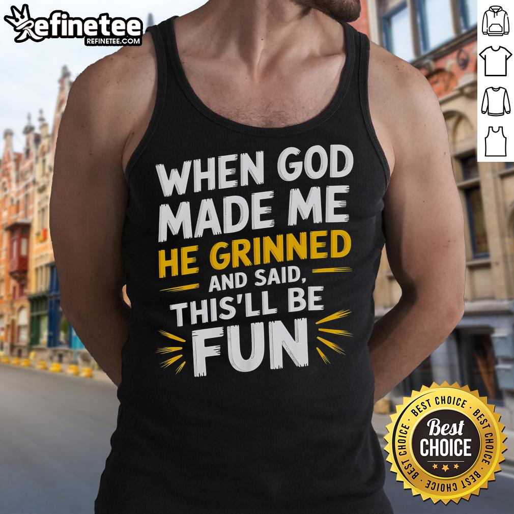 Funny religious quote tank top reading 'When God Made Me He Said This'll Be Fun' in vibrant colors.