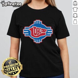 Alt Text: Good New Mexico Lobos Basketball logo on a stylish ladies tee, perfect for fans and casual wear.