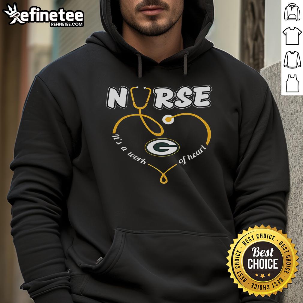 Nice nurse wearing a Green Bay Packers hoodie that says 'It's a Work of Heart,' showcasing team spirit and compassion.