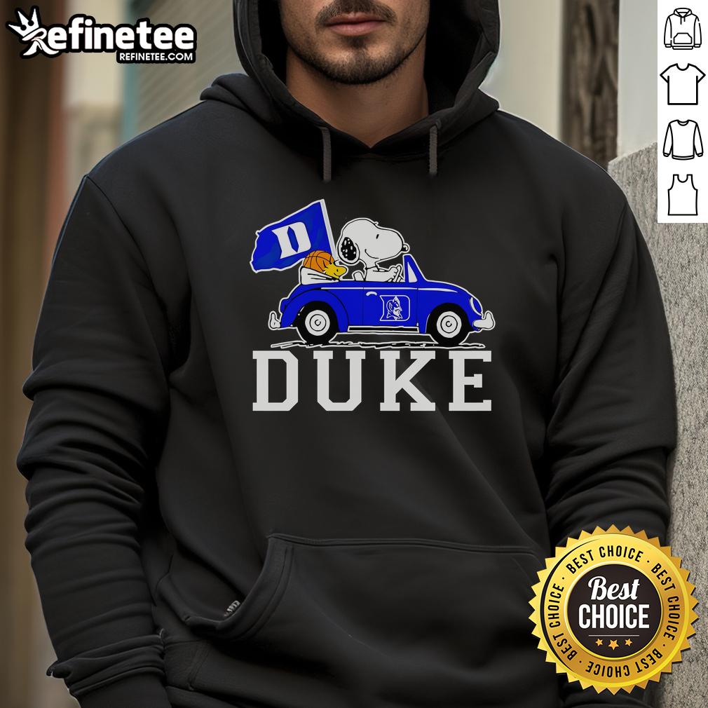 Alt Text: Snoopy and Woodstock driving in a Duke Blue Devils basketball hoodie, showcasing team spirit and fun style.