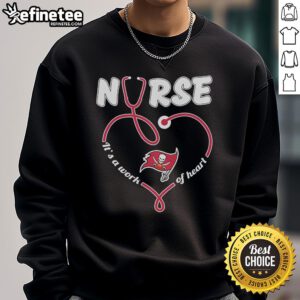 Cozy Nice Tampa Bay Buccaneers nurse sweatshirt with 'It's a Work of Heart' design, perfect for fans and healthcare workers.