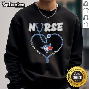 Cozy Nice Toronto Blue Jays Nurse sweatshirt featuring 'It's a Work of Heart' design, perfect for fans and nurses.