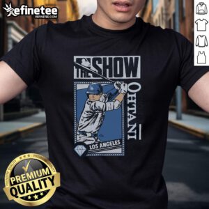 Official MLB The Show Dodgers Shohei Ohtani T-Shirt featuring vibrant graphics and team colors, perfect for fans.