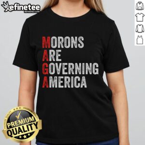 Good Morons Are Governing America Anti-Trump Political Ladies Tee showcasing a bold, humorous design for political apparel.