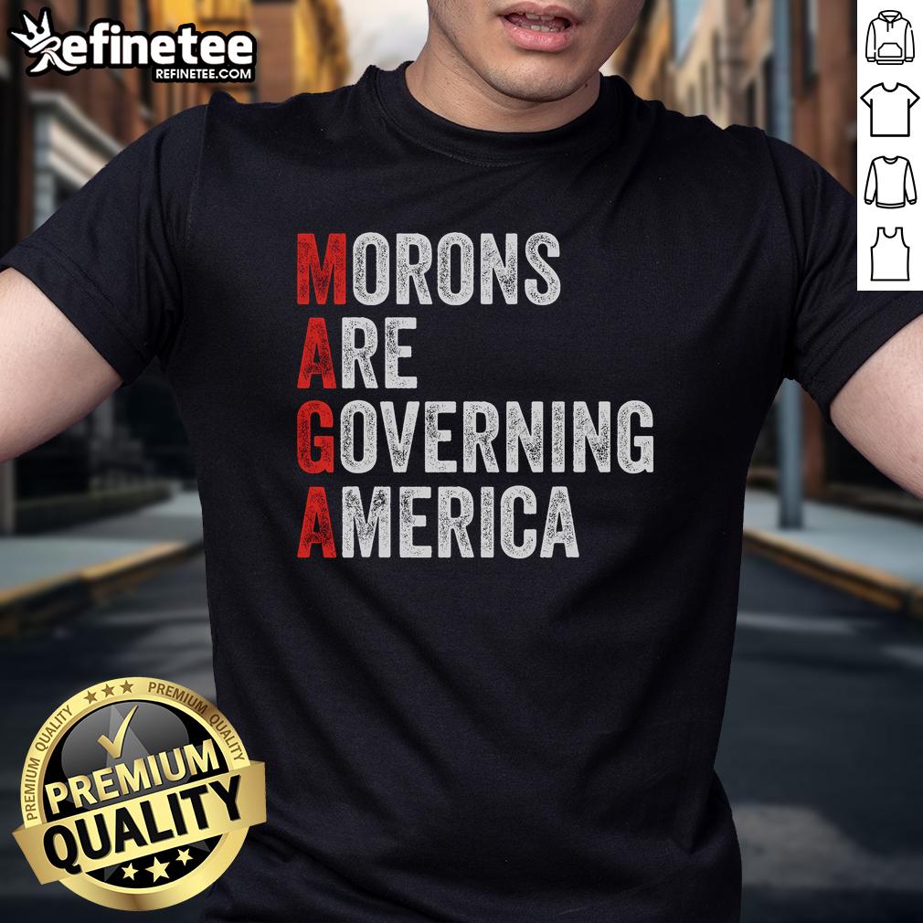 Alt Text: Good Morons Are Governing America Anti Trump Political T-Shirt design featuring bold text and graphic elements.