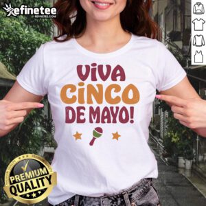 Happy ladies celebrating Cinco de Mayo in festive tees at a vibrant fiesta, showcasing the spirit of the holiday.