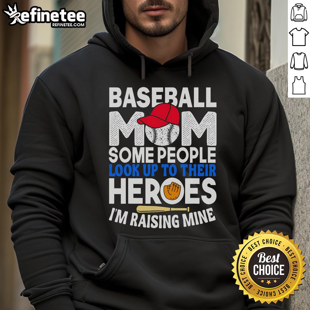 Alt Text: Nice baseball mom hoodie with 'Some people look up to their heroes, I'm raising mine' slogan in stylish font.