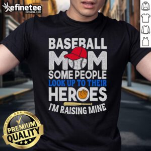 Alt Text: Nice Baseball Mom T-Shirt featuring 'Some People Look Up To Their Heroes, Im Raising Mine' design.