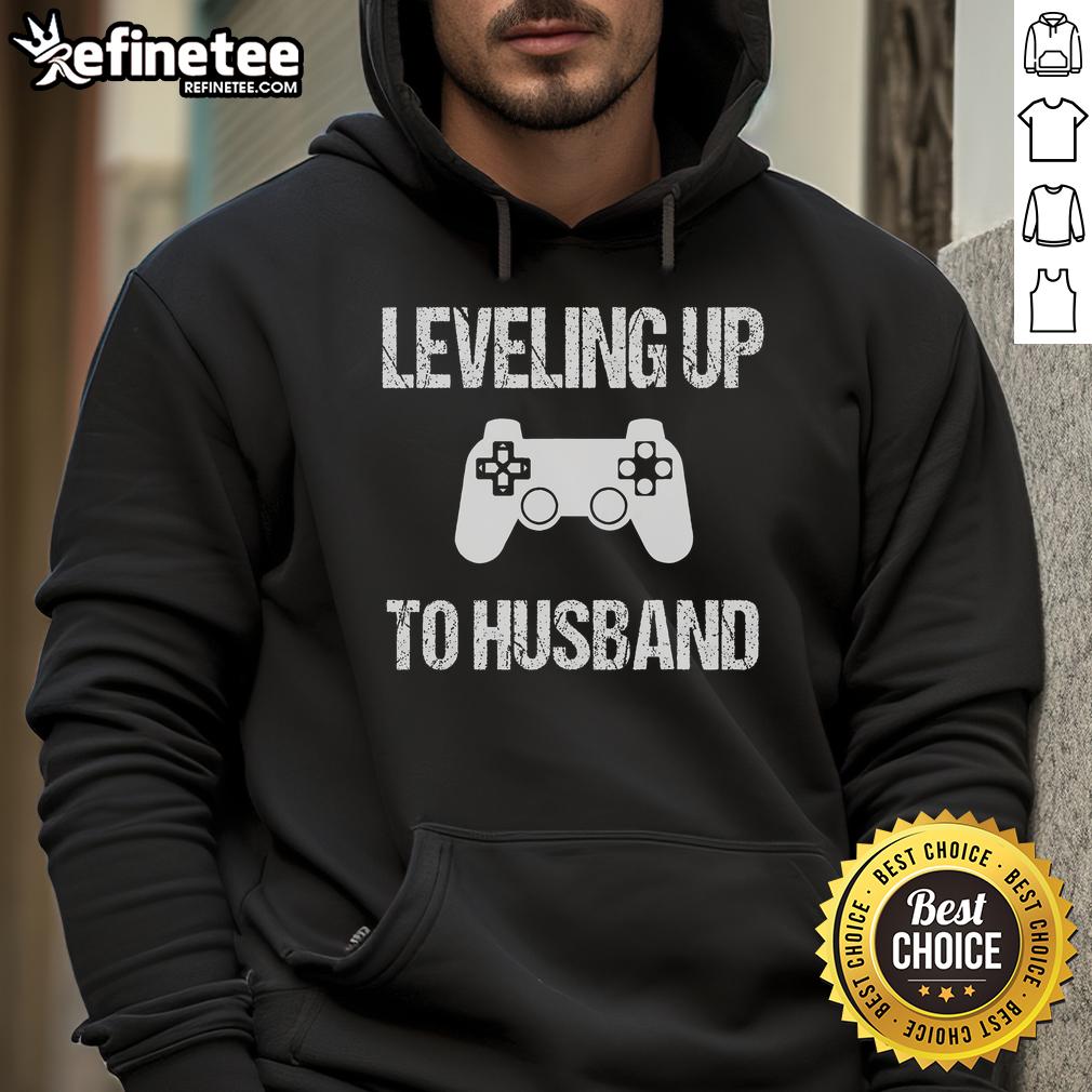 Couple in matching hoodies celebrating engagement, perfect for video game lovers, showcasing their unique style and love.