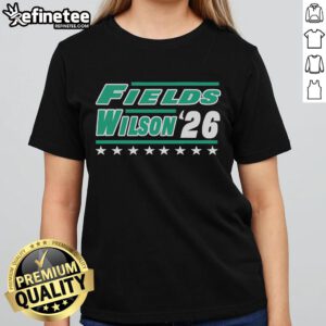 Garrett Wilson 2026 New York Ladies Tee displayed in a scenic field, showcasing stylish design and vibrant colors.