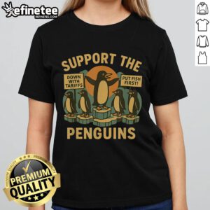 Retro ladies tee featuring nice marching penguins advocating for economic freedom and resisting tariffs.