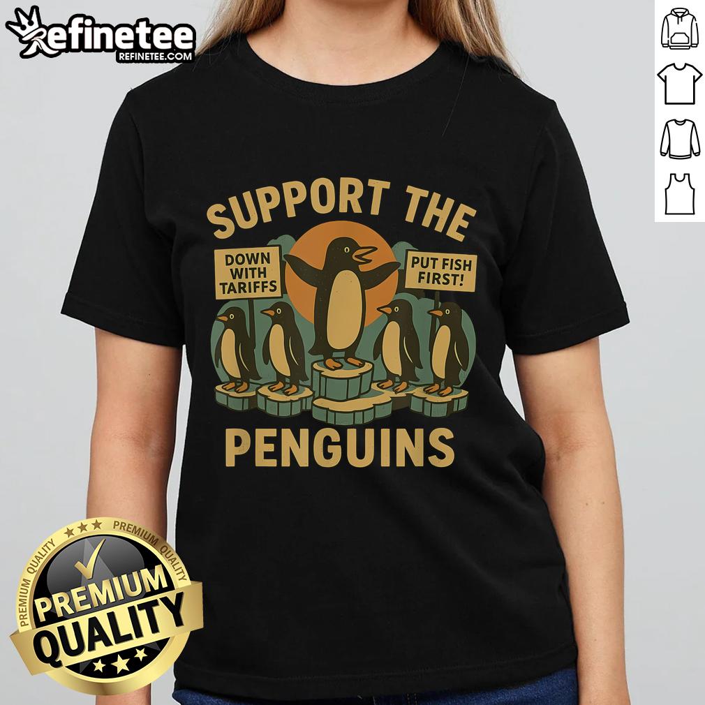 Retro ladies tee featuring nice marching penguins advocating for economic freedom and resisting tariffs.
