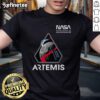 NASA Artemis II mission patch worm logo on an American flag t-shirt, showcasing space exploration pride.