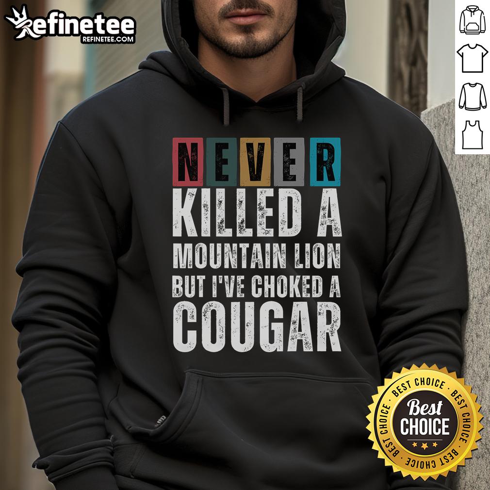 Nice Never Killed A Mountain Lion But I've Choked A Cougar hoodie displayed on a hanger, perfect for casual wear.