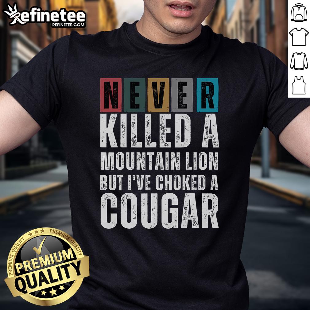Funny 'Nice Never Killed A Mountain Lion But I've Choked A Cougar' T-shirt design featuring playful graphics and bold text.
