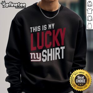 Person wearing a lucky New York Giants sweatshirt, showcasing team pride and style on game day.