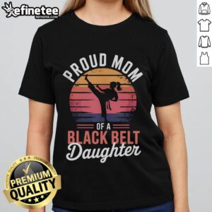 Alt Text: Proud mom wearing a ladies tee celebrating her black belt daughter, showcasing family pride in martial arts achievement.